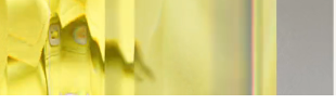 Close crop of yellow shirt fabric detail