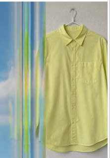 Yellow shirt product image with blue and green motion blur
